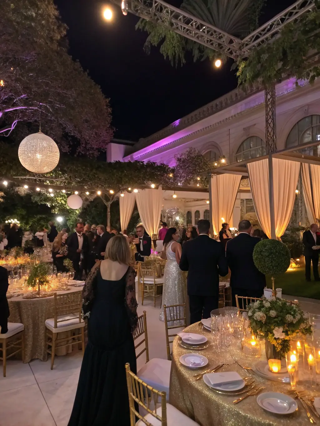 A sophisticated image of a gala dinner in a luxurious venue, showcasing elegant table settings, gourmet food, and guests dressed in formal attire.